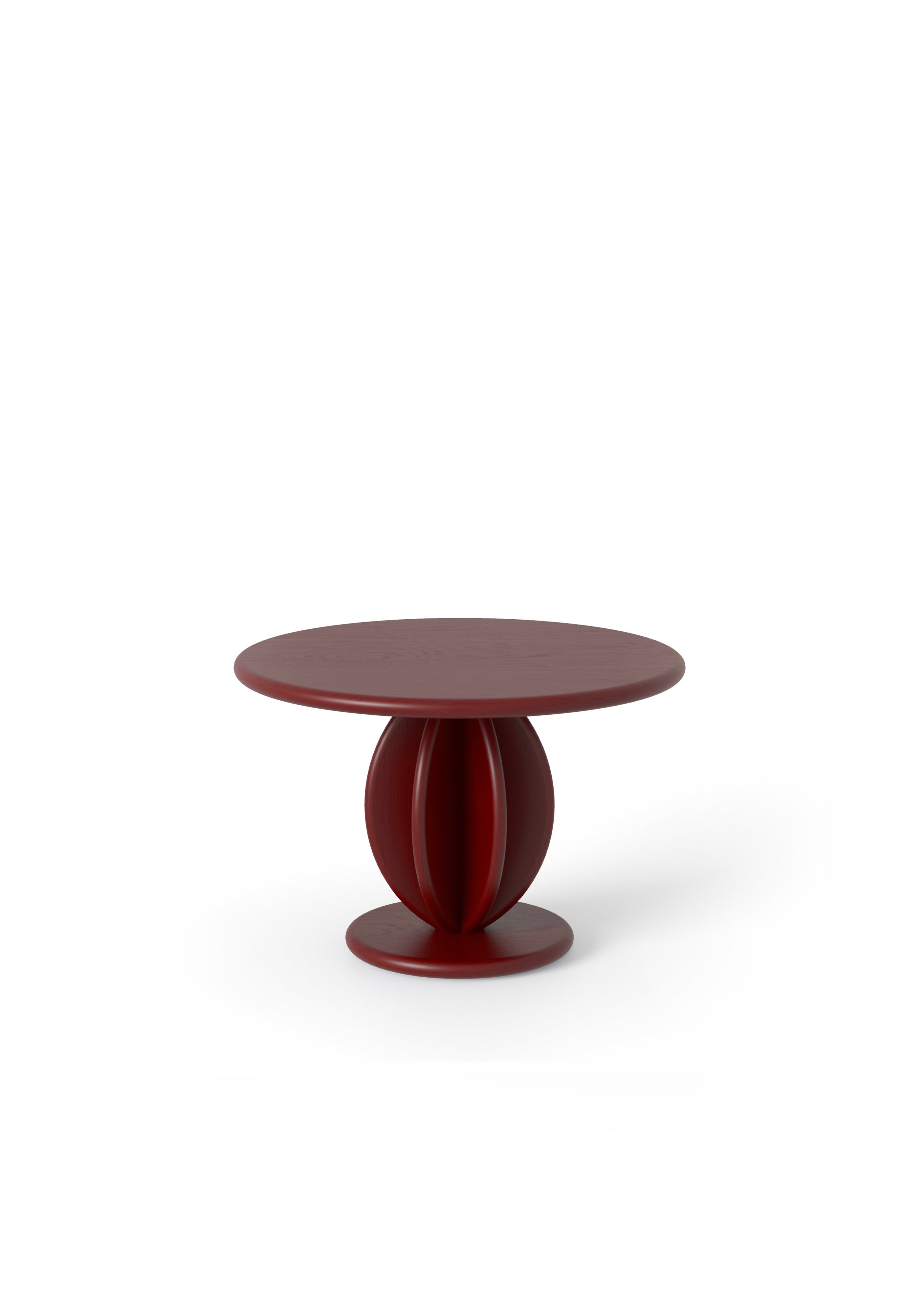 A burgundy table with a round top and two white vases on the top