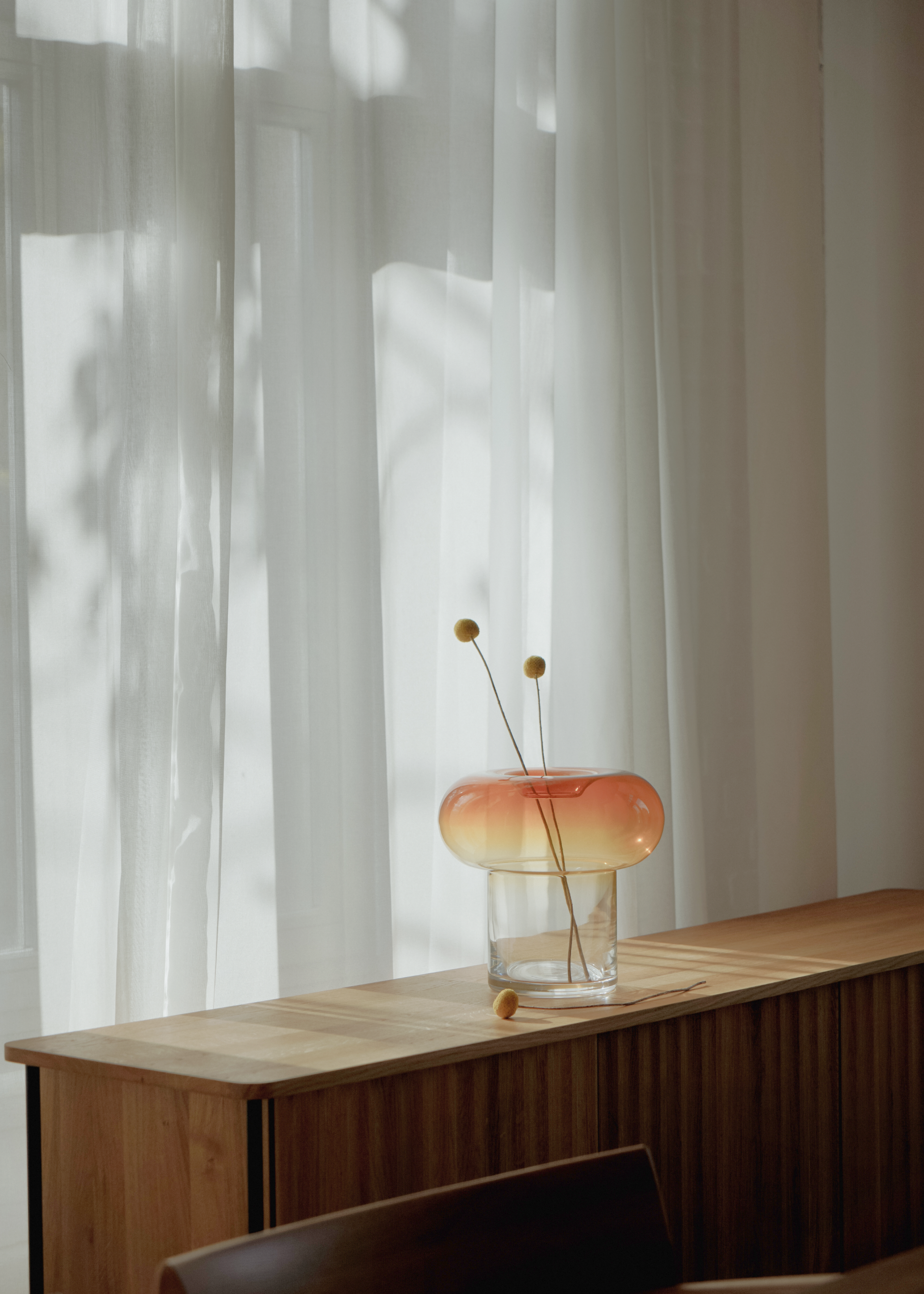 Set of ORIO glass vases with rounded shapes, elegant symmetry, and fluid design