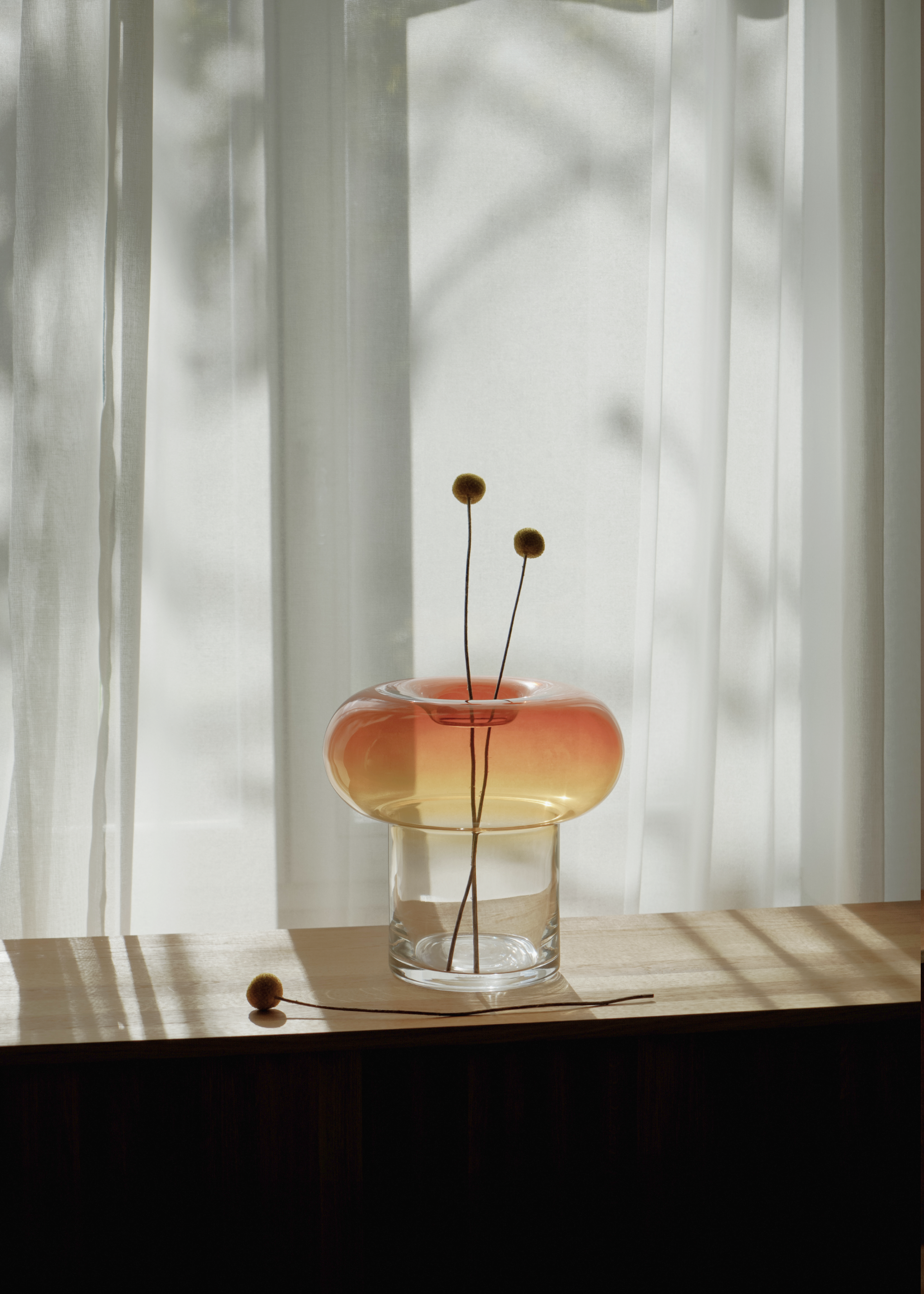 Set of ORIO glass vases with rounded shapes, elegant symmetry, and fluid design