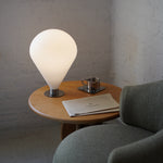 Modern designer table lamp in a contemporary living space