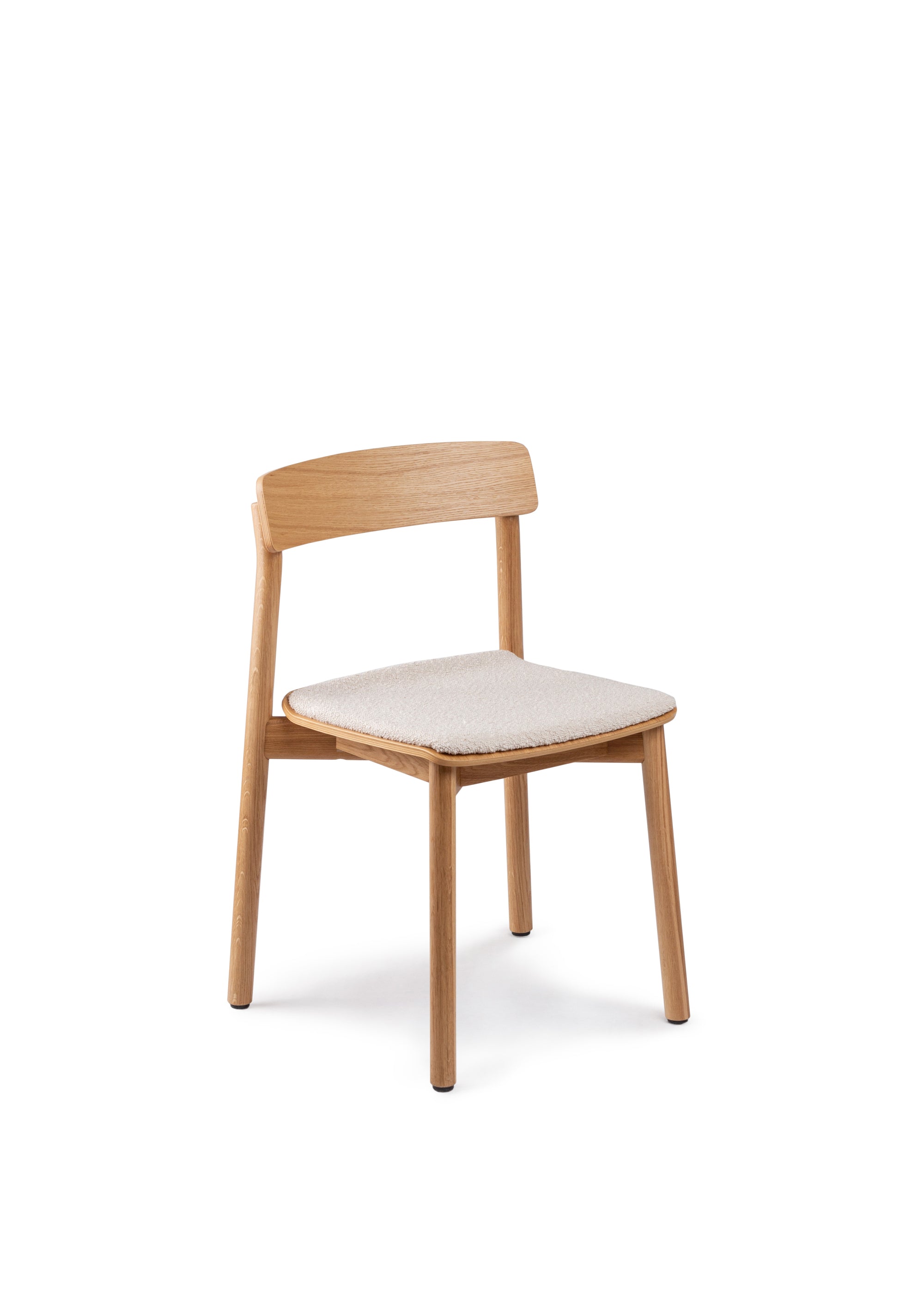 A light oak dining chair with a curved backrest and cushioned fabric seat.