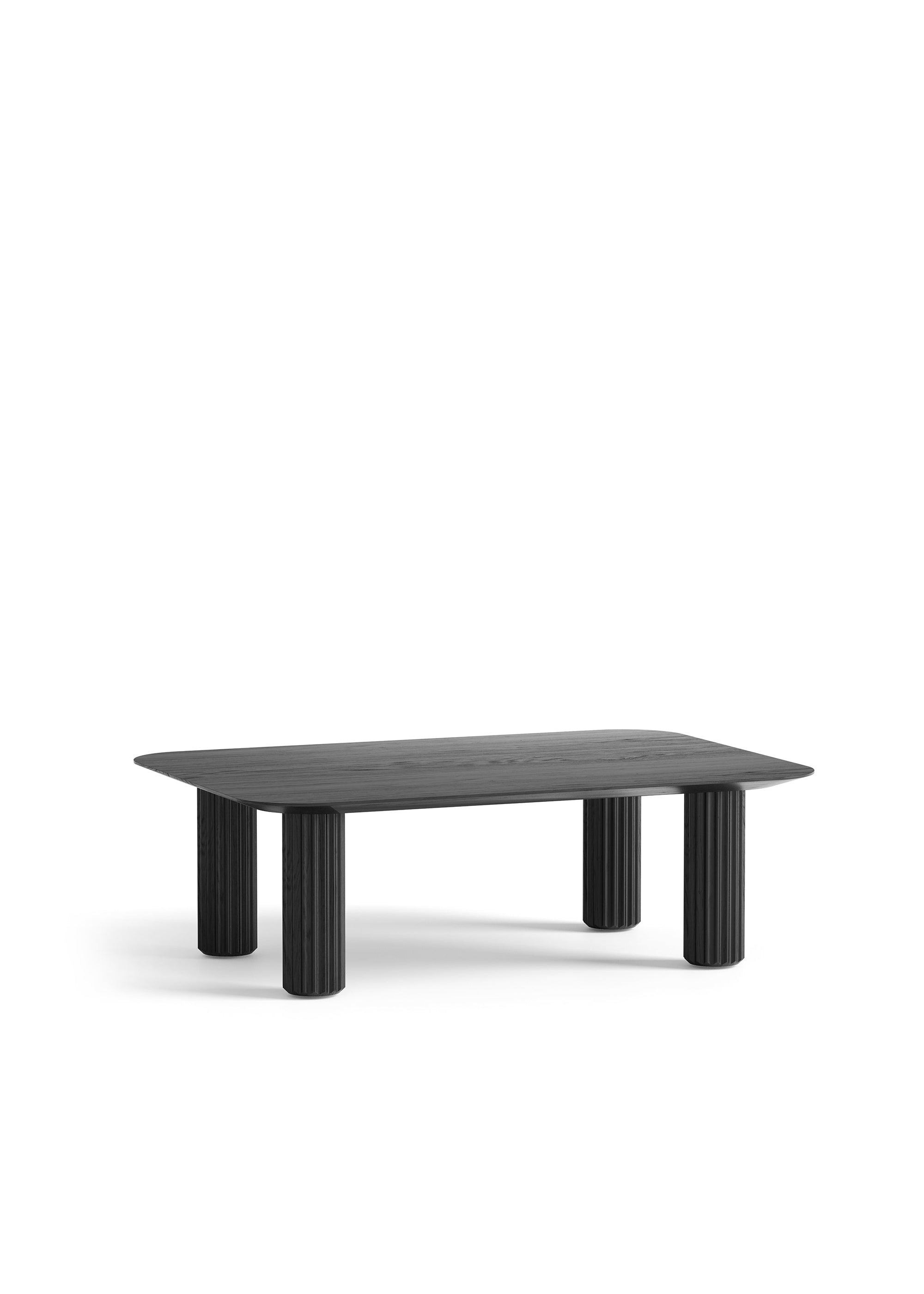 A dark wooden coffee table and matching side table with cylindrical legs arranged in front of a modular grey sofa.