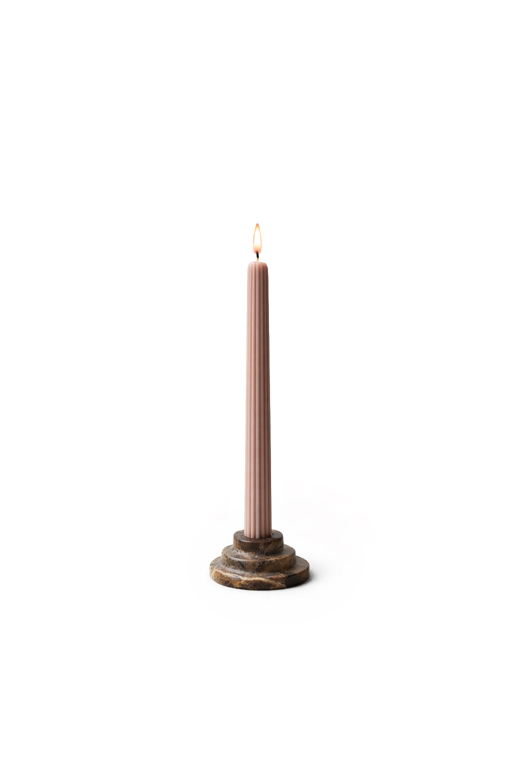 Brown stone candle holder with a long candle